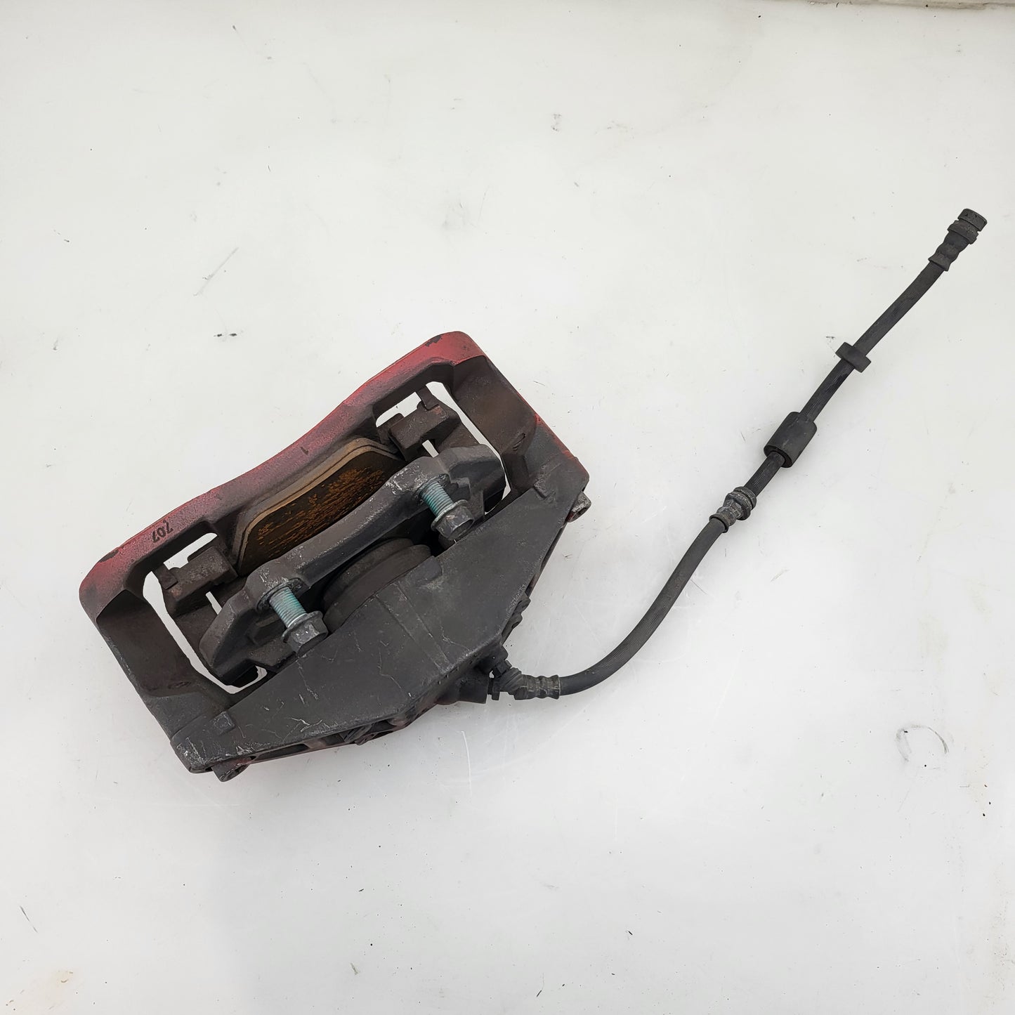 Mazdaspeed 3 gen 1 07-09 OEM driver front caliper red